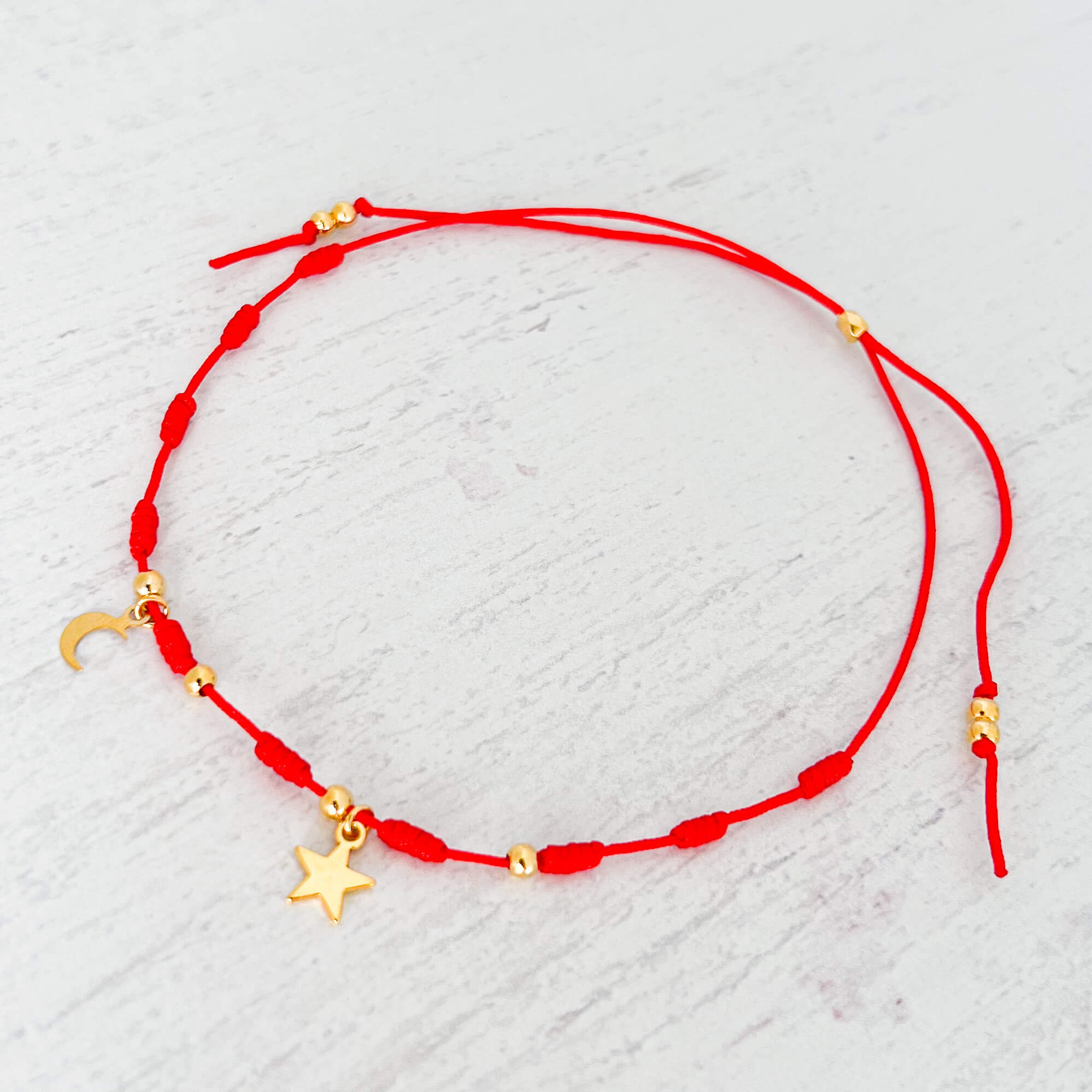 Star and Moon Anklet with Red Yarn